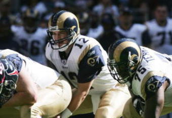 HOUSTON - NOVEMBER 27:  Quarterback Ryan Fitzpatrick #12 and offensive guard Claude Terrell #75 of the St. Louis Rams line up against the Houston Texans at Reliant Stadium on November 27, 2005  in Houston, Texas. The Rams defeated the Texans 33-27 in overtime. (Photo by Ronald Martinez/Getty Images) 
