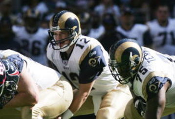 HOUSTON - NOVEMBER 27:  Quarterback Ryan Fitzpatrick #12 and offensive guard Claude Terrell #75 of the St. Louis Rams line up against the Houston Texans at Reliant Stadium on November 27, 2005  in Houston, Texas. The Rams defeated the Texans 33-27 in overtime. (Photo by Ronald Martinez/Getty Images) 