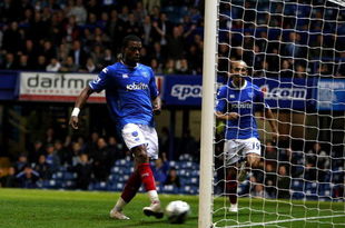 PORTSMOUTH, ENGLAND - OCTOBER 27:  Frederic Piquionne of Portsmouth scores against Stoke City during the Carling Cup fourth round match between Portsmouth and Stoke City at Fratton Park on October 27, 2009 in Portsmouth, England.  (Photo by Phil Cole/Getty Images)