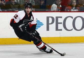 PHILADELPHIA - JANUARY 21:  Simon Gagne #12 of the Philadelphia Flyers skates with the puck against the Atlanta Thrashers at the Wachovia Center on January 21, 2009 in Philadelphia, Pennsylvania. (Photo by Chris McGrath/Getty Images)