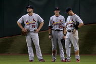 HOUSTON - SEPTEMBER 23: Left fielder Matt Holiday #15, center fielder Colby Rasmus #28 and right fielder Ryan Ludwick #47 of the St. Louis Cardinals chat during a pitching change at Minute Maid Park on September 23, 2009 in Houston, Texas. Houston won 3-0 (Photo by Bob Levey/Getty Images)