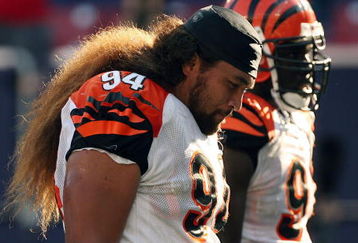 EAST RUTHERFORD, NJ - SEPTEMBER 21:  Domata Peko #94 of the Cincinnati Bengals walks off the field after the loss against the New York Giants on September 21, 2008 at Giants Stadium in East Rutherford, New Jersey. The Giants defeated the Bengals 26-23 in overtime.  (Photo by Elsa/Getty Images)