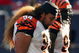 EAST RUTHERFORD, NJ - SEPTEMBER 21:  Domata Peko #94 of the Cincinnati Bengals walks off the field after the loss against the New York Giants on September 21, 2008 at Giants Stadium in East Rutherford, New Jersey. The Giants defeated the Bengals 26-23 in overtime.  (Photo by Elsa/Getty Images)