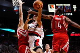 PORTLAND, OR - OCTOBER 27:  Brandon Roy #7 of the Portland Trail Blazers drives against Carl Landry #14 and David Andersen #13 of the Houston Rockets during the season opener on October 27, 2009 at the Rose Garden in Portland, Oregon. NOTE TO USER: User expressly acknowledges and agrees that, by downloading and or using this Photograph, user is consenting to the terms and conditions of the Getty Images License Agreement.  (Photo by Jonathan Ferrey/Getty Images)