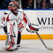 UNIONDALE, NY - OCTOBER 24:  Jose Theodore #60 of the Washington Capitals looks on against the New York Islanders on October 24, 2009 at Nassau Coliseum in Uniondale, New York. The Capitals won the game 3-2 in overtime.  (Photo by Jim McIsaac/Getty Images)