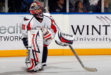 UNIONDALE, NY - OCTOBER 24:  Jose Theodore #60 of the Washington Capitals looks on against the New York Islanders on October 24, 2009 at Nassau Coliseum in Uniondale, New York. The Capitals won the game 3-2 in overtime.  (Photo by Jim McIsaac/Getty Images)