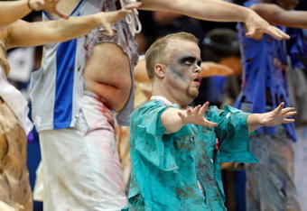 DALLAS - OCTOBER 27:  Entertainers perform to Michael Jackson's 'Thriller' during play between the Washington Wizards and the Dallas Mavericks on October 27, 2009 at American Airlines Center in Dallas, Texas.  NOTE TO USER: User expressly acknowledges and agrees that, by downloading and/or using this Photograph, user is consenting to the terms and conditions of the Getty Images License Agreement.  (Photo by Ronald Martinez/Getty Images)