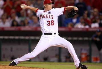 ANAHEIM, CA - OCTOBER 22:  Jered Weaver #36 of the Los Angeles Angels of Anaheim pitches in the eight inning against the New York Yankees in Game Five of the ALCS during the 2009 MLB Playoffs at Angel Stadium on October 22, 2009 in Anaheim, California.  (Photo by Stephen Dunn/Getty Images)