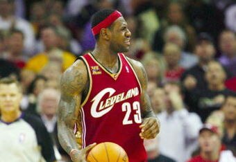 CLEVELAND - OCTOBER 27:  LeBron James #23 of the Cleveland Cavaliers reacts during the season opener against the Boston Celtics at Quicken Loans Arena on October 27, 2009 in Cleveland, Ohio.  NOTE TO USER: User expressly acknowledges and agrees that, by downloading and or using this photograph, User is consenting to the terms and conditions of the Getty Images License Agreement. (Photo by Gregory Shamus/Getty Images)
