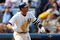 NEW YORK - APRIL 02:  Alex Rodriguez #13  of the New York Yankees watches his hit against Tampa Bay Devil Rays during their Opening Day game at Yankee Stadium April 2, 2007 in the Bronx borough of New York City. The Yankees defeated the Devil Rays, 9-5.   (Photo by Chris Trotman/Getty Images)