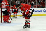 CHICAGO - MAY 24:  (L-R) Corey Crawford #50, Duncan Keith #2 and Brent Seabrook #7 of the Chicago Blackhawks look on dejected as they stand on the ice against the Detroit Red Wings during Game Four of the Western Conference Championship Round of the 2009 Stanley Cup Playoffs on May 24, 2009 at the United Center in Chicago, Illinois.  (Photo by Jonathan Daniel/Getty Images)