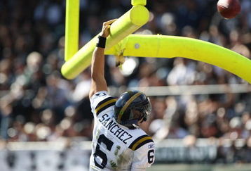 OAKLAND, CA - OCTOBER 25:  Mark Sanchez #6 of the New York Jets looks celebrates after rushing for a touchdown in the first quarter against the Oakland Raiders during an NFL game at the Oakland-Alameda County Coliseum on October 25, 2009 in Oakland, California.  (Photo by Jed Jacobsohn/Getty Images)