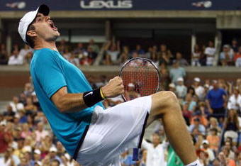 NEW YORK - SEPTEMBER 05:  John Isner celebrates after defeating Andy Roddick during day six of the 2009 U.S. Open at the USTA Billie Jean King National Tennis Center on September 5, 2009 in the Flushing neighborhood of the Queens borough of New York City.  (Photo by Al Bello/Getty Images)
