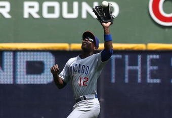 MILWAUKEE - JULY 31:  Alfonso Soriano #12 of the Chicago Cubs leaps as he makes a catch of a fly ball hit by Prince Fielder of the Milwaukee Brewers at Miller Park on July 31, 2008 in Milwaukee, Wisconsin. The Cubs defeated the Brewers 11-4.  (Photo by Jonathan Daniel/Getty Images)