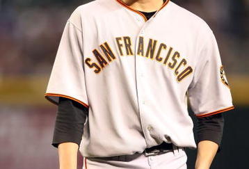 PHOENIX - JUNE 11:  Starting pitcher Jonathan Sanchez #57 of the San Francisco Giants reacts during the major league baseball game against the Arizona Diamondbacks at Chase Field on June 11, 2009 in Phoenix, Arizona.  The Diamondbacks defeated the Giants 2-1.  (Photo by Christian Petersen/Getty Images)