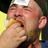 FORT WORTH, TX - JUNE 07:  Jacob Hannah competes in a hot dog eating contest, prior to the IRL IndyCar Series Bombardier Learjet 550k on June 7, 2008 at the Texas Motor Speedway in Fort Worth, Texas.  (Photo by Streeter Lecka/Getty Images)
