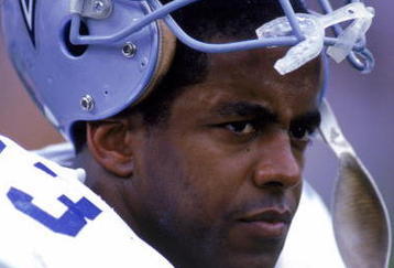 1988:  Running back Tony Dorsett #33 of the Dallas Cowboys looks on from the sideline during a game in the 1988 season.  (Photo by Rick Stewart/Getty Images)