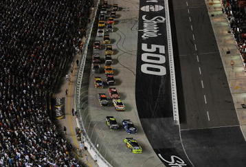 BRISTOL, TN - AUGUST 22:  Mark Martin, driver of the #5 Pop Tarts/CARQUEST Chevrolet, leads the field during the NASCAR Sprint Cup Series Sharpie 500 at Bristol Motor Speedway on August 22, 2009 in Bristol, Tennessee.  (Photo by Ronald Martinez/Getty Images)