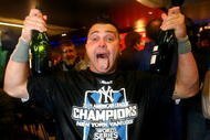 NEW YORK - OCTOBER 25:  Nick Swisher #33 of the New York Yankees celebrates their 5-2 victory over the Los Angeles Angels of Anaheim in Game Six of the ALCS during the 2009 MLB Playoffs at Yankee Stadium on October 25, 2009 in the Bronx borough of New York City. The New York Yankees won the ALCS series 4-2 over the Los Angeles Angels of Anaheim to capture the American League pennant.  (Photo by Al Bello/Getty Images)