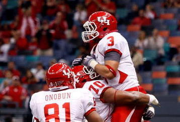 NEW ORLEANS - OCTOBER 17:  Justin Johnson #3 of the Houston Cougars celebrates after a touchdown against the Tulane Green Wave at the Louisiana Superdome on October 17, 2009 in New Orleans, Louisiana.  The Cougars defeated the Green Wave 44-16.  (Photo by Chris Graythen/Getty Images)