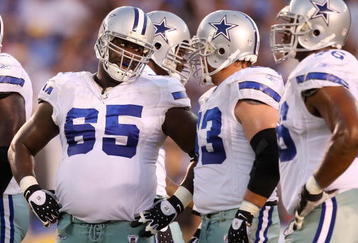 SAN DIEGO - AUGUST 09:  (L-R))Andre Gurode #65 talks with teammate Kyle Kosier #63 of the Dallas Cowboys during a pre-season game against the San Diego Chargers at Qualcomm Stadium on August 9, 2008 in San Diego, California.  (Photo by Lisa Blumenfeld/Getty Images)