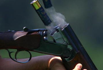 BEIJING - AUGUST 03:  Cartridges pop out of a Shotgun as a competitor practices ahead of the Beijing 2008 Olympics at the Beijing Shooting Range CTF on August 3, 2008 in Beijing, China.  (Photo by Julian Finney/Getty Images)