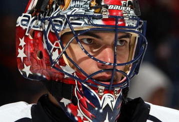 UNIONDALE, NY - OCTOBER 24:  Jose Theodore #60 of the Washington Capitals looks on against the New York Islanders on October 24, 2009 at Nassau Coliseum in Uniondale, New York. The Capitals won the game 3-2 in overtime.  (Photo by Jim McIsaac/Getty Images)