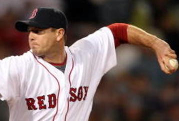 BOSTON - SEPTEMBER 29:  Billy Wagner #13 of the Boston Red Sox delivers a pitch in the eighth inning against the Toronto Blue Jays on September 29, 2009 at Fenway Park in Boston, Massachusetts.  (Photo by Elsa/Getty Images)
