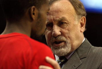HOUSTON - APRIL 24:  Head coach Rick Adelman talks with Aaron Brooks #0 of the Houston Rockets during play against the Portland Trail Blazers in Game Three of the Western Conference Quarterfinals during the 2009 NBA Playoffs at Toyota Center on April 24, 2009 in Houston, Texas. NOTE TO USER: User expressly acknowledges and agrees that, by downloading and or using this photograph, User is consenting to the terms and conditions of the Getty Images License Agreement.  (Photo by Ronald Martinez/Getty Images)