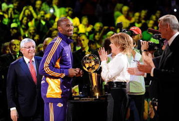 LOS ANGELES, CA - OCTOBER 27:  Kobe Bryant #24 of the Los Angeles Lakers receives his championship ring from Executive Vice President of Business Operations Jeanie Buss before the season opening game against the Los Angeles Clippers at Staples Center on October 27, 2009 in Los Angeles, California.  NOTE TO USER: User expressly acknowledges and agrees that, by downloading and or using this photograph, User is consenting to the terms and conditions of the Getty Images License Agreement. Mandatory Copyright Notice: Copyright 2009 NBAE  (Photo by Kevork Djansezian/Getty Images)
