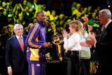 LOS ANGELES, CA - OCTOBER 27:  Kobe Bryant #24 of the Los Angeles Lakers receives his championship ring from Executive Vice President of Business Operations Jeanie Buss before the season opening game against the Los Angeles Clippers at Staples Center on October 27, 2009 in Los Angeles, California.  NOTE TO USER: User expressly acknowledges and agrees that, by downloading and or using this photograph, User is consenting to the terms and conditions of the Getty Images License Agreement. Mandatory Copyright Notice: Copyright 2009 NBAE  (Photo by Kevork Djansezian/Getty Images)