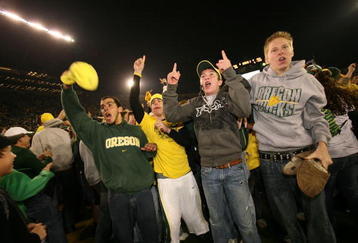 EUGENE, OR - NOVEMBER 03:  Oregon Ducks fans celebrate after defeating the Arizona State Sun Devils 35-23  at Autzen Stadium on November 3, 2007 in Eugene, Oregon. (Photo by Otto Greule Jr/Getty Images)