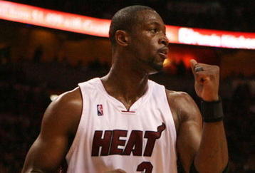 MIAMI - MAY 01:  Dwyane Wade #3 of the Miami Heat pumps his fist after the heat get a stop in the fourth quarter against the Atlanta Hawks during Game Six of the Eastern Conference Quarterfinals at American Airlines Arena on May 1, 2009 in Miami, Florida. The Heat defeated the Hawks 98-72. NOTE TO USER: User expressly acknowledges and agrees that, by downloading and/or using this Photograph, user is consenting to the terms and conditions of the Getty Images License Agreement.  (Photo by Doug Benc/Getty Images)