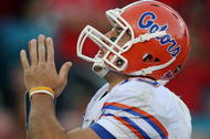 JACKSONVILLE, FL - NOVEMBER 01: Quarterback Tim Tebow #15 of the Florida Gators celebrates his touchdown run in the third quarter against the Georgia Bulldogs at Jacksonville Municipal Stadium on November 1, 2008 in Jacksonville, Florida. Florida defeated Georgia 49-10. (Photo by Doug Benc/Getty Images)