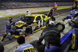 CONCORD, NC - OCTOBER 17:  AJ Allmendinger, driver of the #44 Best Buy Dodge, makes a pit stop during the NASCAR Sprint Cup Series NASCAR Banking 500 at Lowe's Motor Speedway on October 17, 2009 in Concord, North Carolina.  (Photo by John Harrelson/Getty Images for NASCAR)