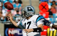 CHARLOTTE, NC - SEPTEMBER 16:  Defensive end Mario Williams #90 of the Houston Texans grabs ahold of quarterback Jake Delhomme #17 of the Carolina Panthers as Delhomme releases the ball during the Texans 34-21 win at Bank of America Stadium on September 16, 2007 in Charlotte, North Carolina.  (Photo by Kevin C. Cox/Getty Images)