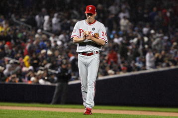 NEW YORK - OCTOBER 28:  Cliff Lee #34 of the Philadelphia Phillies rubs the baseball in his hands against the New York Yankees in Game One of the 2009 MLB World Series at Yankee Stadium on October 28, 2009 in the Bronx borough of New York City.  (Photo by Jim McIsaac/Getty Images)