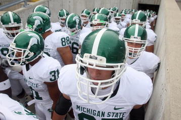 MADISON, WI - SEPTEMBER 26: Members of the Michigan State Spartans wait to enter the field of play before a game against the Wisconsin Badgers on September 26, 2009 at Camp Randall Stadium in Madison, Wisconsin. (Photo by Jonathan Daniel/Getty Images)