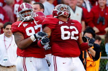 TUSCALOOSA, AL - OCTOBER 24:  Lorenzo Washington #97 celebrates with Terrence Cody #62 of the Alabama Crimson Tide after Cody blocked a field goal in the first half against the Tennessee Volunteers at Bryant-Denny Stadium on October 24, 2009 in Tuscaloosa, Alabama.  (Photo by Kevin C. Cox/Getty Images)