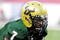 TAMPA, FL - OCTOBER 15: Quarterback B. J. Daniels #7 of the University of South Florida Bulls warms up for play against the Cincinnati Bearcats October 15, 2009 at Raymond James Stadium in Tampa, Florida.  (Photo by Al Messerschmidt/Getty Images)