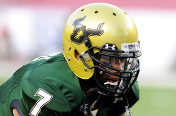 TAMPA, FL - OCTOBER 15: Quarterback B. J. Daniels #7 of the University of South Florida Bulls warms up for play against the Cincinnati Bearcats October 15, 2009 at Raymond James Stadium in Tampa, Florida.  (Photo by Al Messerschmidt/Getty Images)
