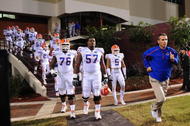 STARKVILLE, MS - OCTOBER 24:  Head coach Urban Meyer of the University of Florida Gators, leads the team onto the field against the Mississippi State Bulldogs, at Davis Wade Stadium on  October 24, 2009 in Starkville, Mississippi  (Photo by Rick Dole/Getty Images)