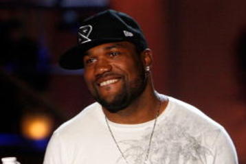 STUDIO CITY, CA - JUNE 09:  UFC Light Heavyweight Mixed Martial Arts Champion Quinton 'Rampage' Jackson and actress Carmen Electra present the Kingpin' award onstage during Spike TV's First Annual 'Guys Choice' taped at Radford Studios on June 9, 2007 in Studio City, California.  Spike TV's 'Guys Choice' premieres June 13, 2007 at 10:00pm ET/PT.  (Photo by Kevin Winter/Getty Images)