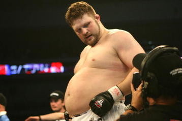 LAS VEGAS - FEBRUARY 29:  Roy Nelson white trunks of Lion's Den celebrates his victory over Fabiano Scherner red trunks of Team Quest during their Heavyweight title bout at The Orleans Arena on February 29, 2008 in Las Vegas, Nevada.  (Photo by Ethan Miller/Getty Images)