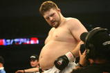 LAS VEGAS - FEBRUARY 29:  Roy Nelson white trunks of Lion's Den celebrates his victory over Fabiano Scherner red trunks of Team Quest during their Heavyweight title bout at The Orleans Arena on February 29, 2008 in Las Vegas, Nevada.  (Photo by Ethan Miller/Getty Images)