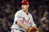 NEW YORK - OCTOBER 28:  Cliff Lee #34 of the Philadelphia Phillies throws a pitch against the New York Yankees in Game One of the 2009 MLB World Series at Yankee Stadium on October 28, 2009 in the Bronx borough of New York City.  (Photo by Jim McIsaac/Getty Images)