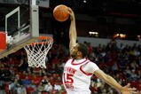 LAS VEGAS - MARCH 12:  Carlon Brown #15 of the Utah Utes is fouled by Ronnie Moss #5 of the Texas Christian University Horned Frogs as he tries to dunk during a quarterfinal game of the Conoco Mountain West Conference Basketball Championships at the Thomas & Mack Center March 12, 2009 in Las Vegas, Nevada. The Utes won 61-58.  (Photo by Ethan Miller/Getty Images)