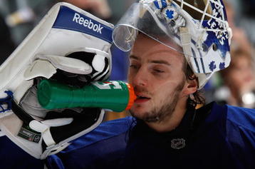 TORONTO - OCTOBER 6:  Jonas Gustavsson #50 of the Toronto Maple Leafs drinks water from a Gatorade bottle during the game against the Ottawa Senators at Air Canada Centre on October 6, 2009 in Toronto, Ontario, Canada. (Photo by Dave Sandford/Getty Images)