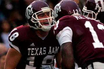 COLLEGE STATION, TX - NOVEMBER 23:  T.J. Sanders #18 of the Texas A&M Aggies celebrates a touchdown with Martellus Bennett #13 against the Texas Longhorns in the second quarter at Kyle Field on November 23, 2007 in College Station, Texas.  (Photo by Ronald Martinez/Getty Images)
