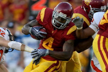 LOS ANGELES - OCTOBER 24:  Running back Joe McKnight #4 of the USC Trojans carries the ball against the Oregon State Beavers on October 24, 2009 at the Los Angeles Coliseum in Los Angeles, California.   (Photo by Stephen Dunn/Getty Images)